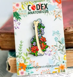 Codex Anatomicus Enamel Pins^Femur with flowers - Enamel pin
