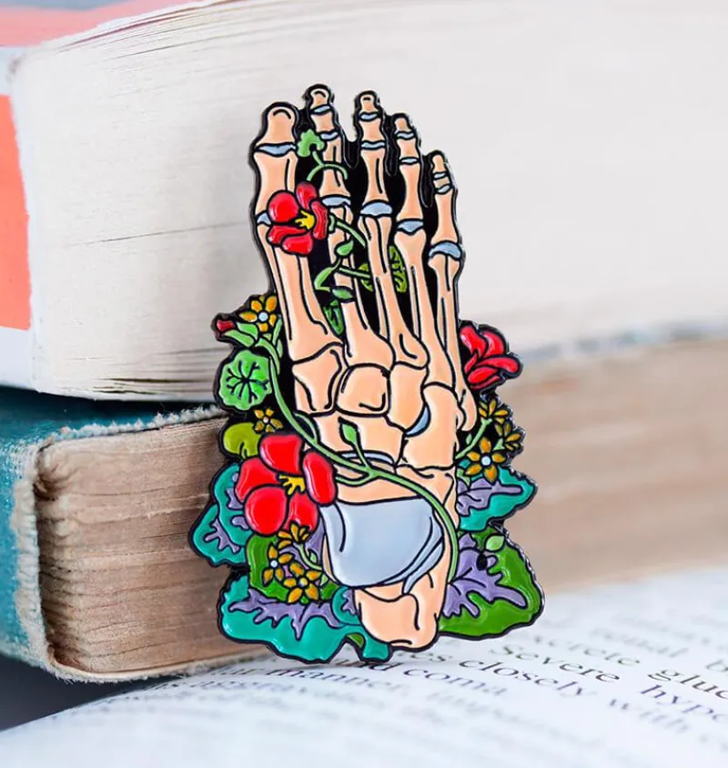 Codex Anatomicus Enamel Pins^Foot skeleton with flowers - Enamel pin