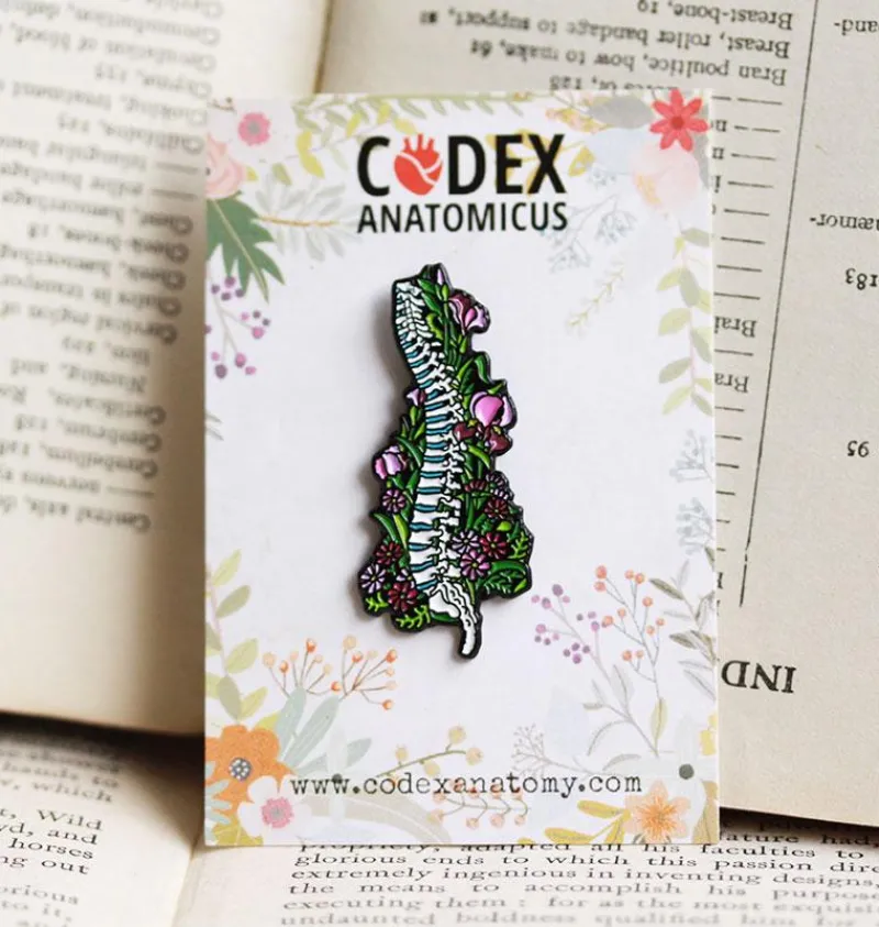 Codex Anatomicus Enamel Pins^Spine with flowers - Enamel pin